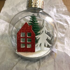 House & tree decorated christmas bauble